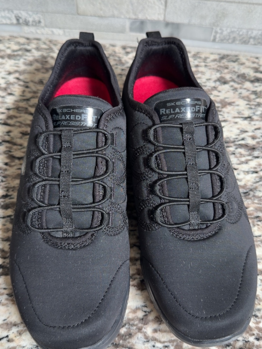 Skechers Black Slip-On Sneakers with Red Insole